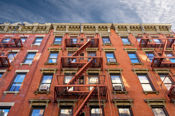 New-York building facades with fire escape stairs view from street