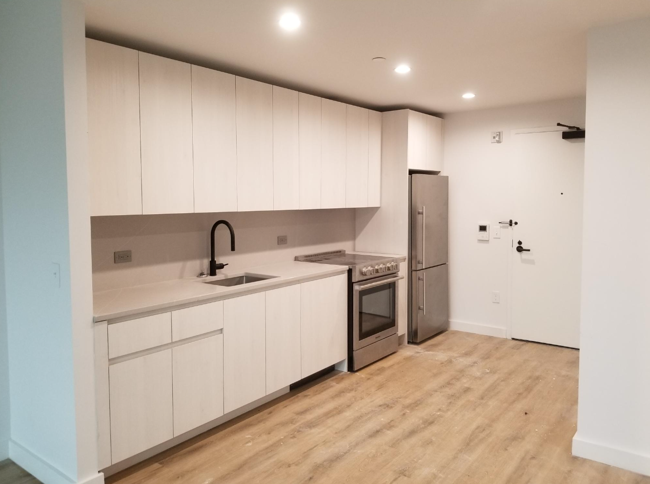 interior galley kitchen of apartment building in Queens