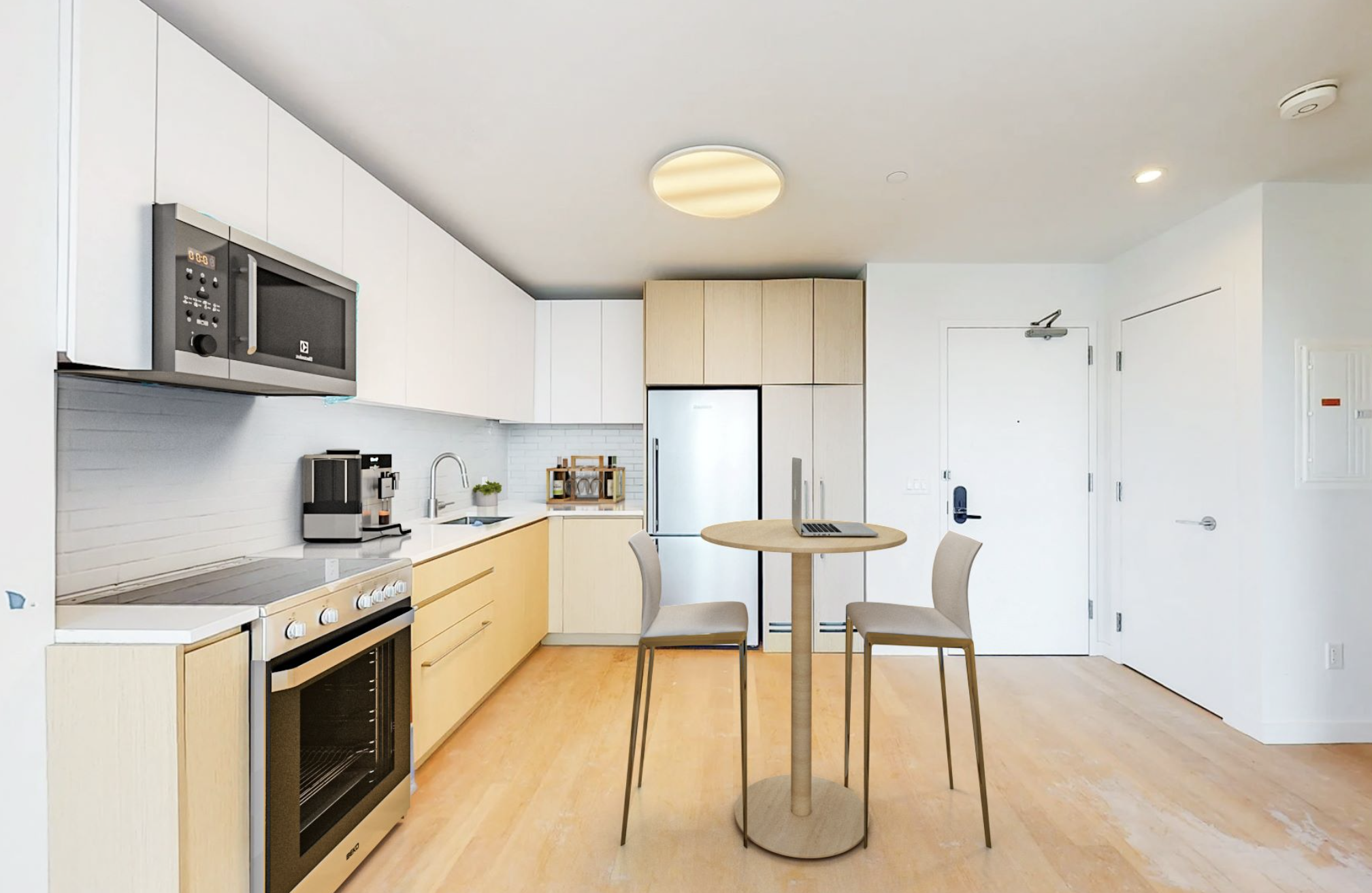 NYC apartment interior with wood floor, stainless steel appliances and barstools