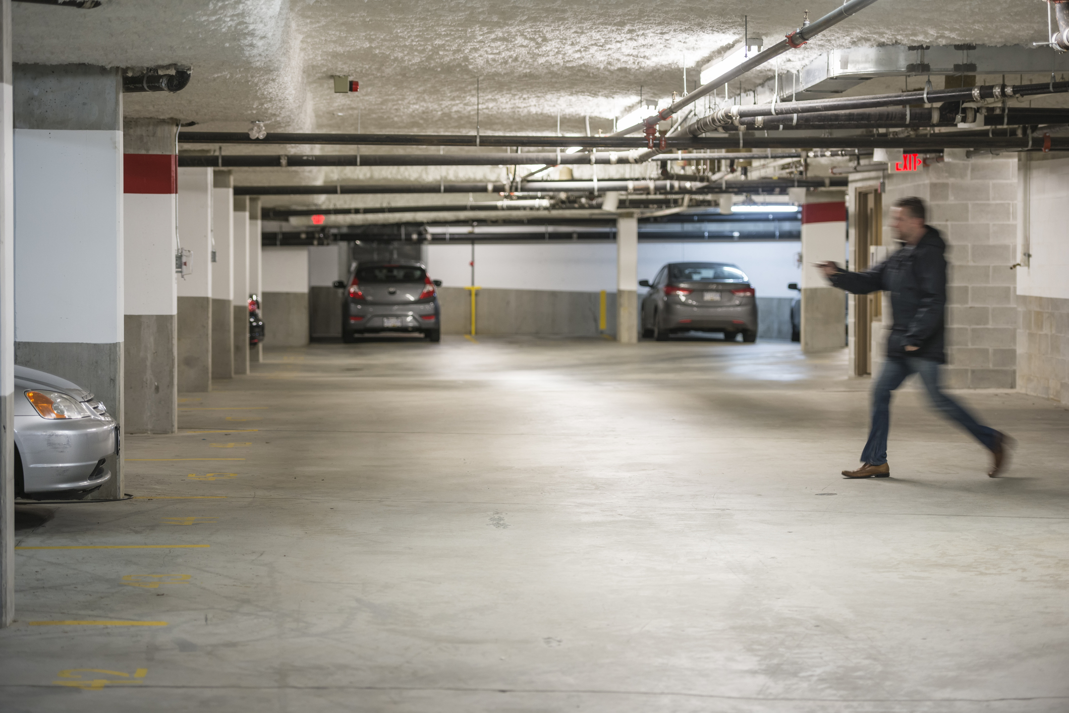 GettyImages-536616801.jpg Man Rushing To Car In Parking Garage