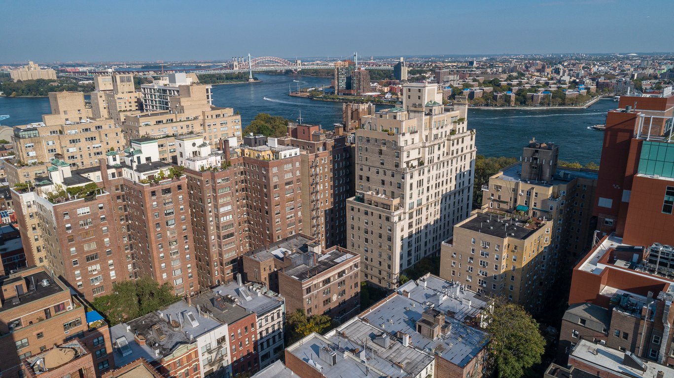 Aerial panoramic scenic view over Upper East Side Manhattan and East River toward Astoria, Queens, New York, USA