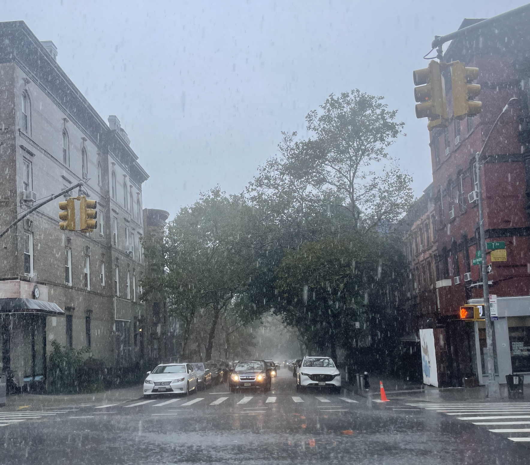 Heavy rain falls on the corner of Seventh Avenue and 5th Street at around 12:30 p.m. in Park Slope, Brooklyn.