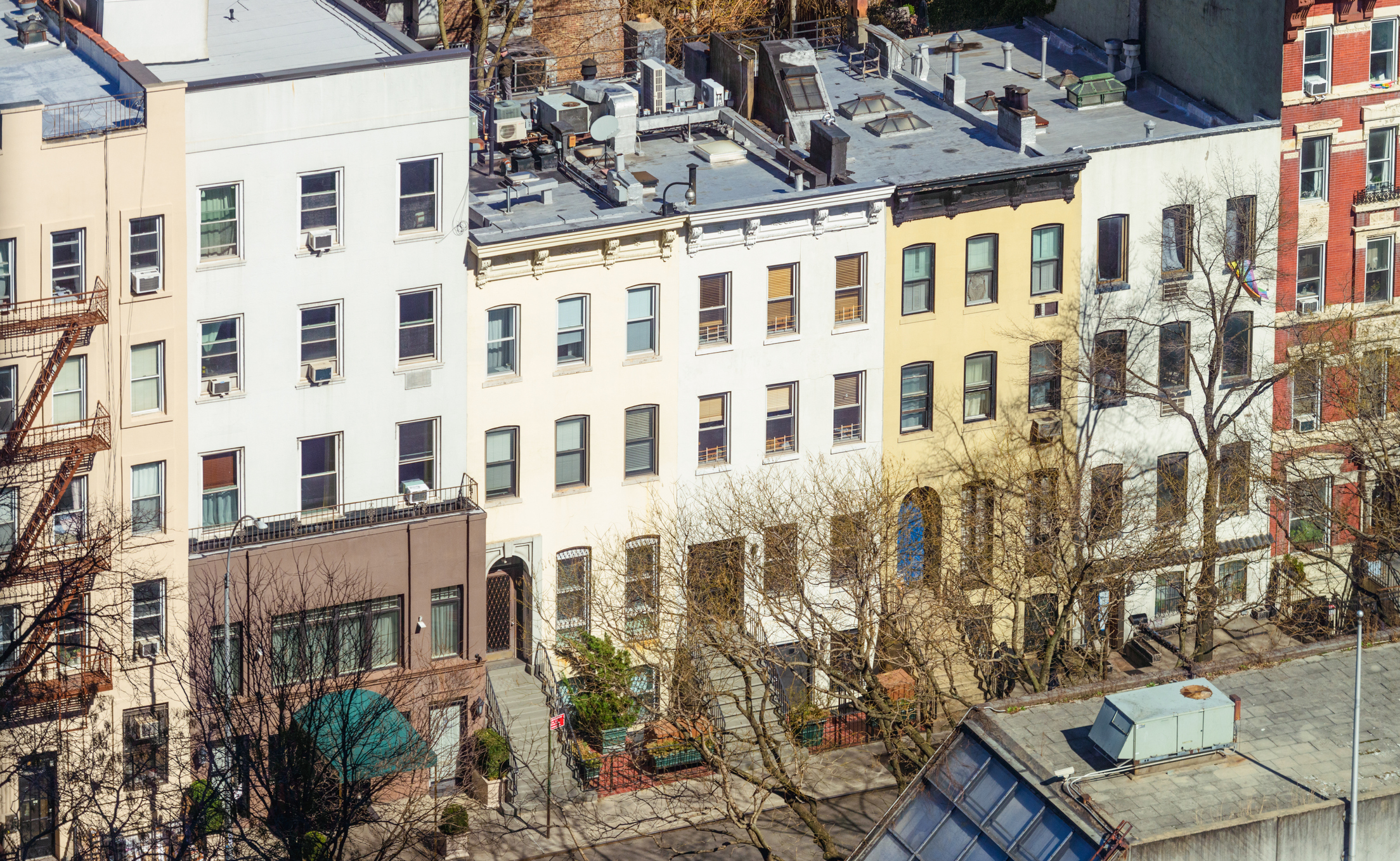 A high angle view of a traditional residential street Hell's Kitchen, Midtown Manhattan in New York City.