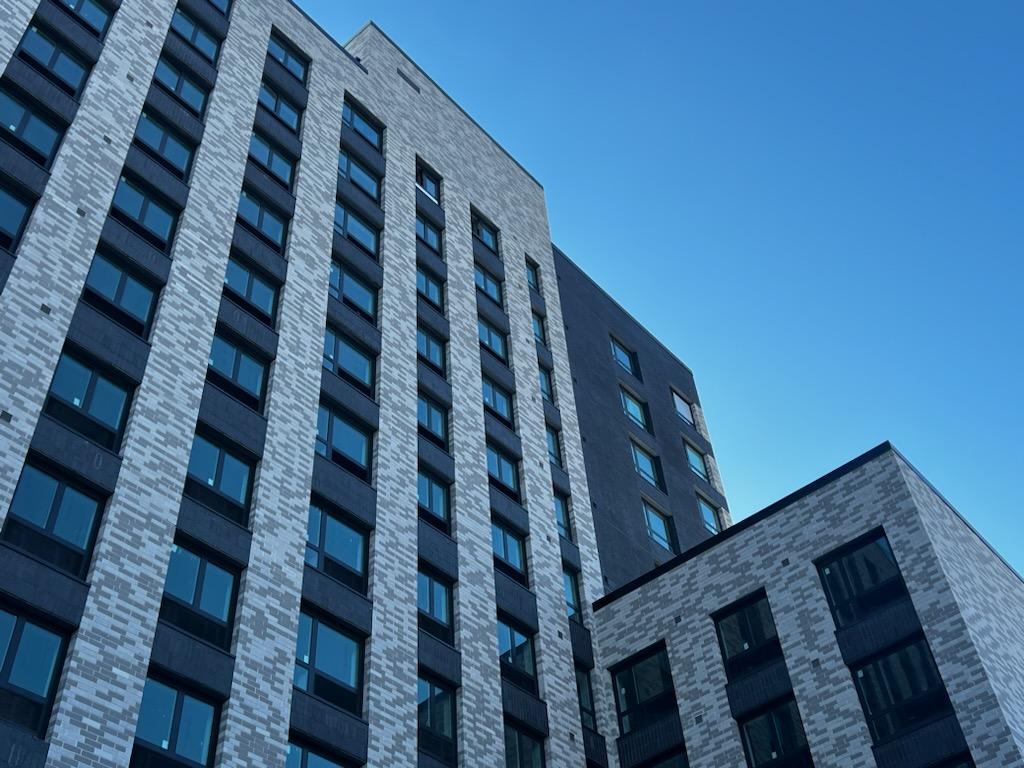 A photo of the top of 475 Bay Street, a 12-story affordable housing development in Staten Island.