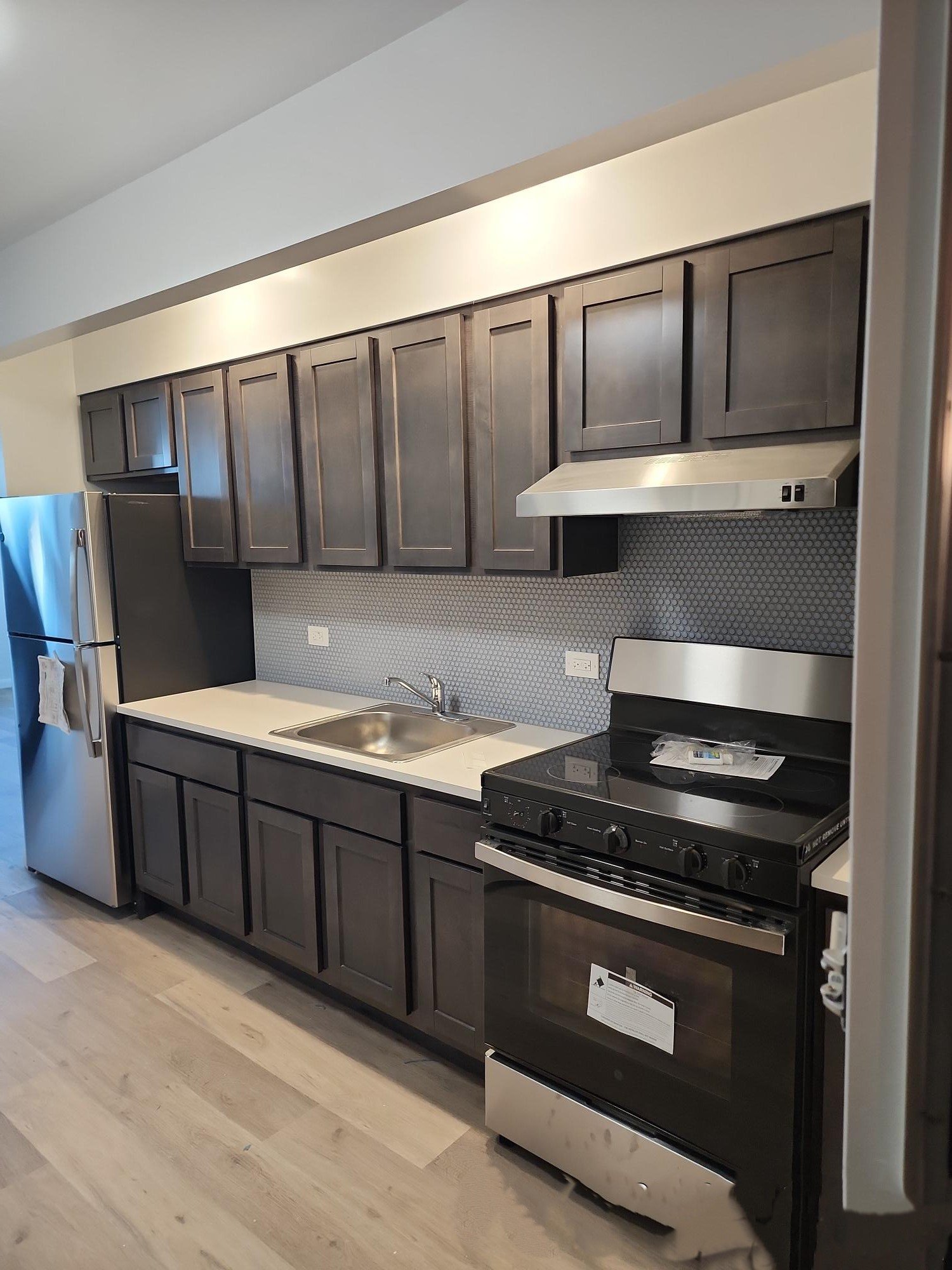 A rendering of one of the kitchens inside the building at 5123 Beach Channel Dr. A rendering of one of the kitchens inside the building at 5123 Beach Channel Dr.
