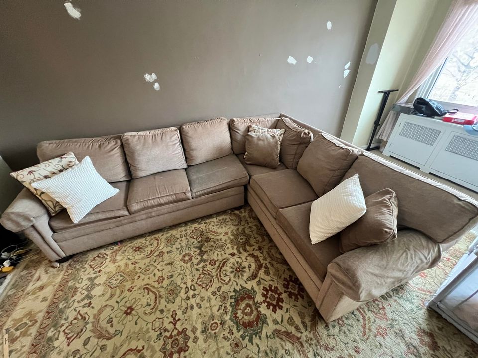 The author's well-worn, six-seater Ethan Allen sleeper couch