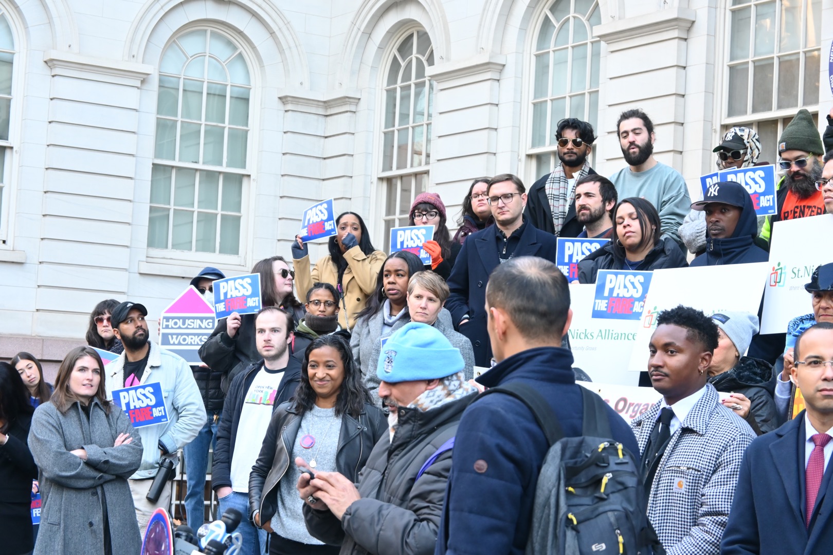 Supporters of the FARE act gather before the vote, including Anna Klenkar (bottom left), an agent with Sotheby's that supports the bill.