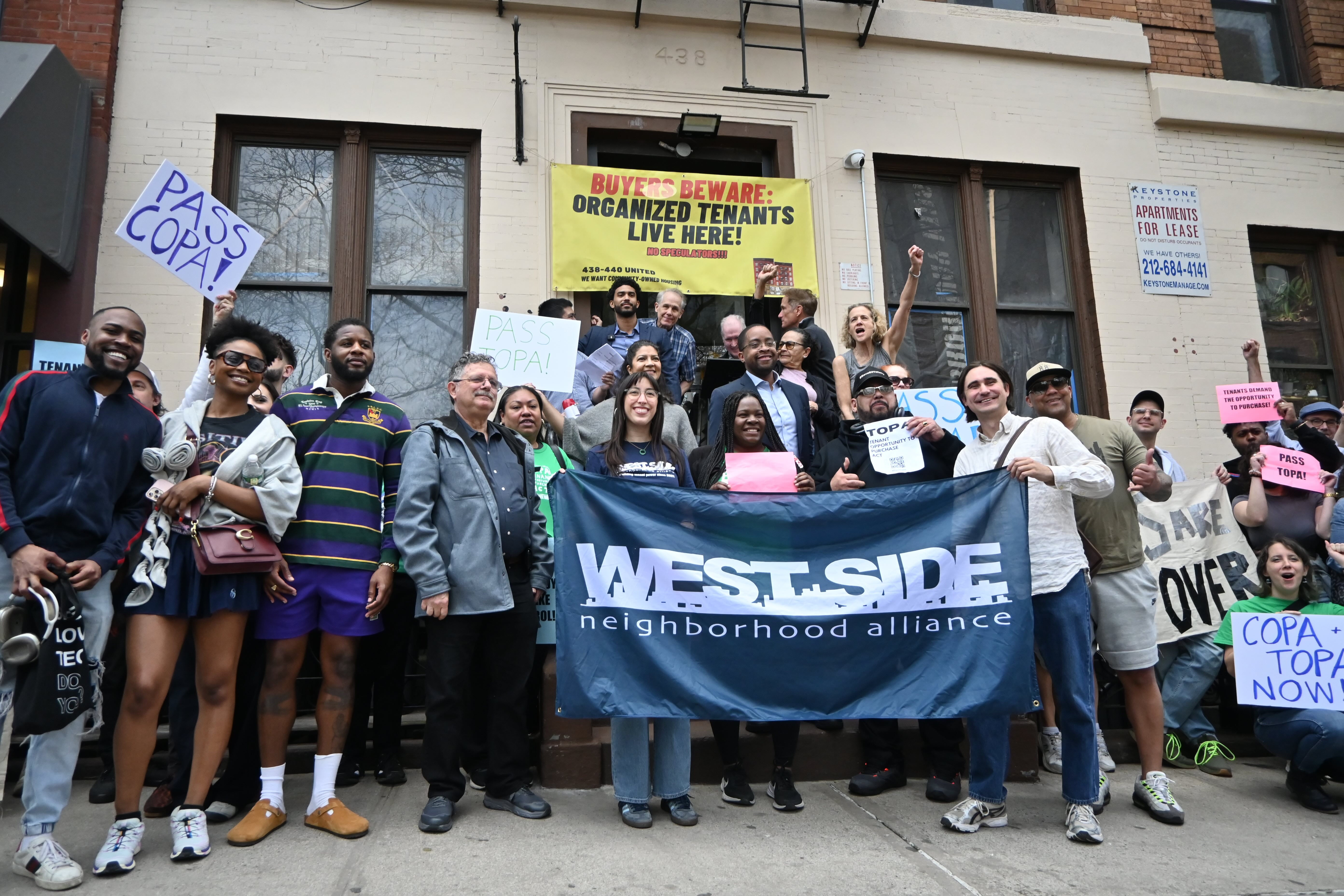 Tenants of 438 and 440 West 45th Street spoke in support of two bills that would give tenants, nonprofits, and community land trusts first crack at buying their apartment buildings. Tenants of 438 and 440 West 45th Street gathered on the stoop of the apartment building at 438.