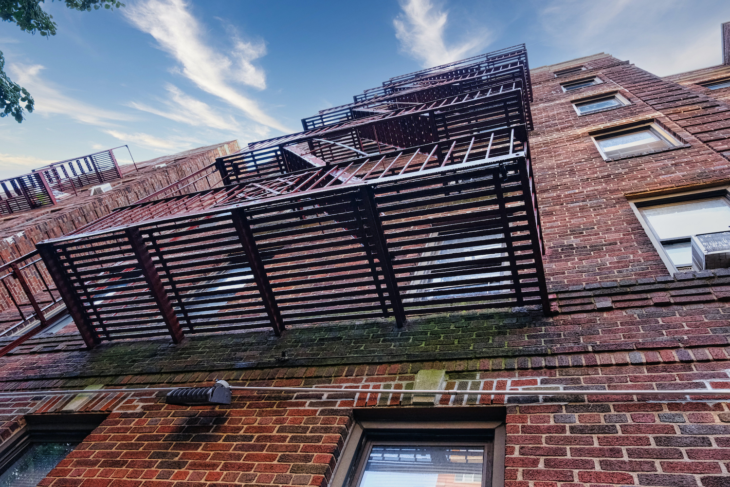 Fire escape on brick apartment building in NYC