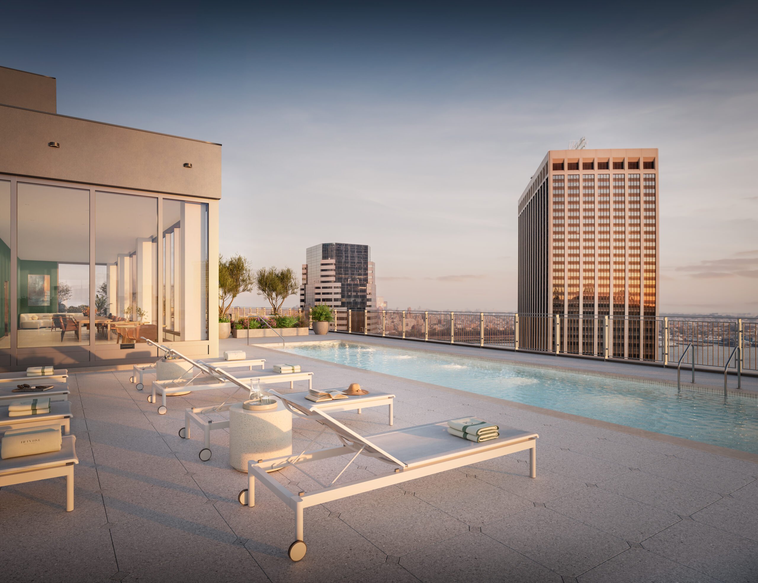 A rendering of the rooftop pool at 55 Broad Street, overlooking the Financial District. A rendering of the rooftop pool at 55 Broad Street, overlooking the Financial District.