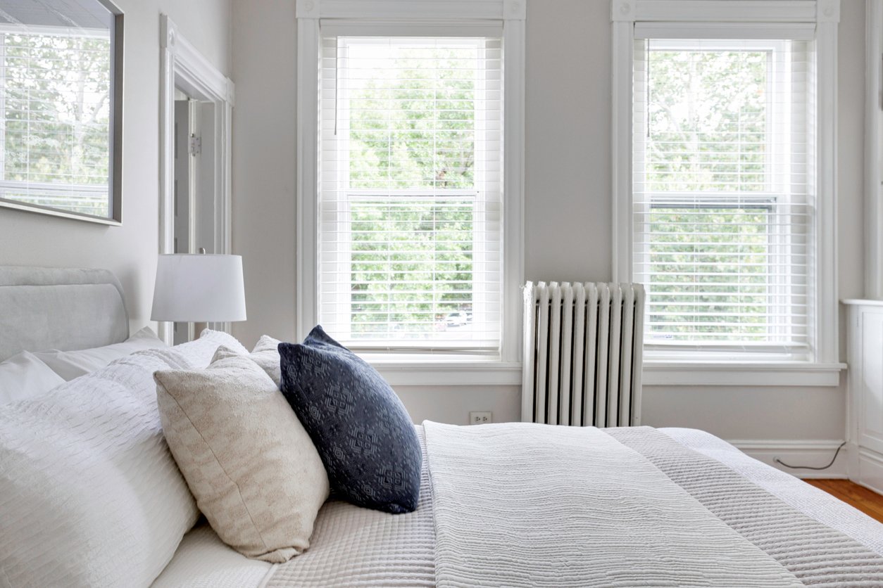 Bedroom with cast iron radiator