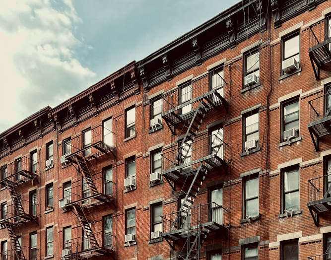 NYC apartment buildings with fire escapes