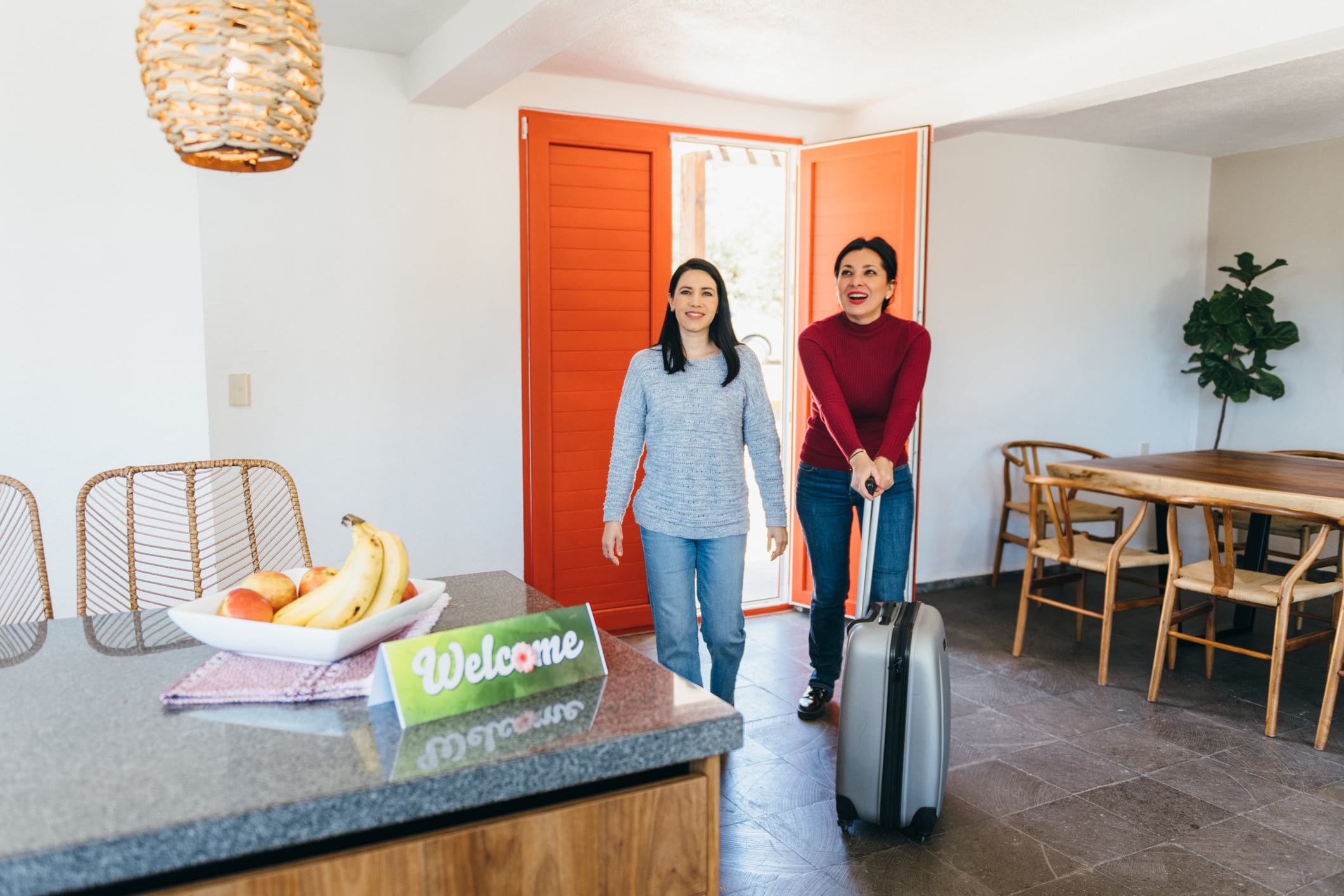 Travelers arriving at new rental apartment