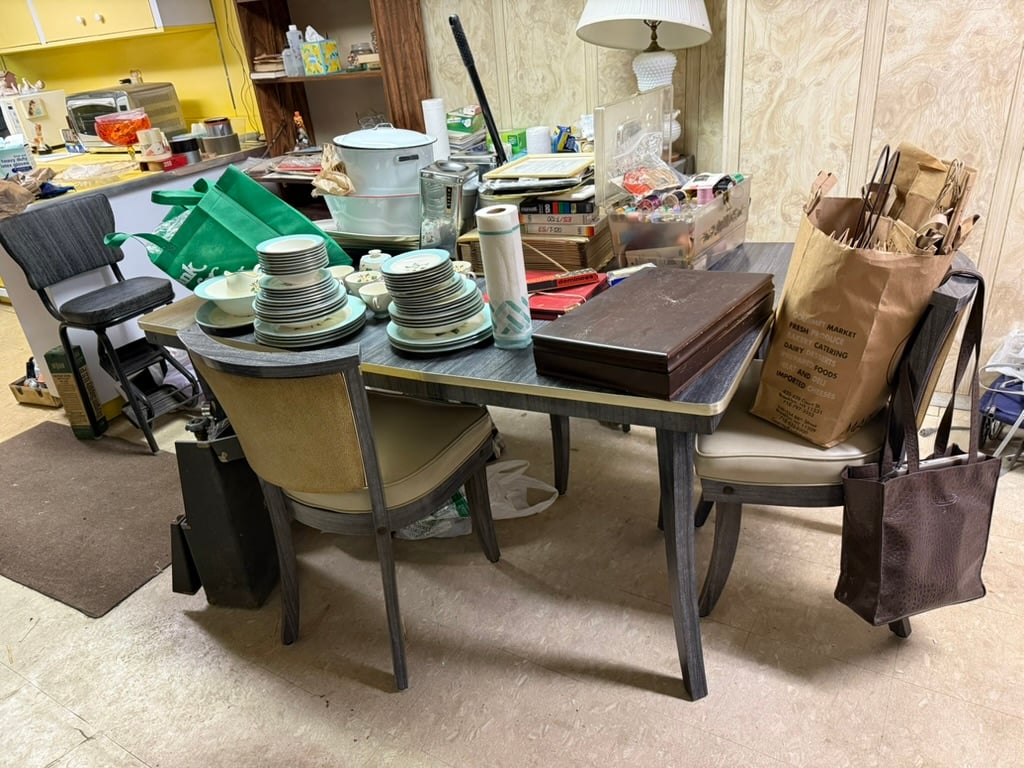 A view of the dining table mid-clean out. A view of the dining table mid-clean out.