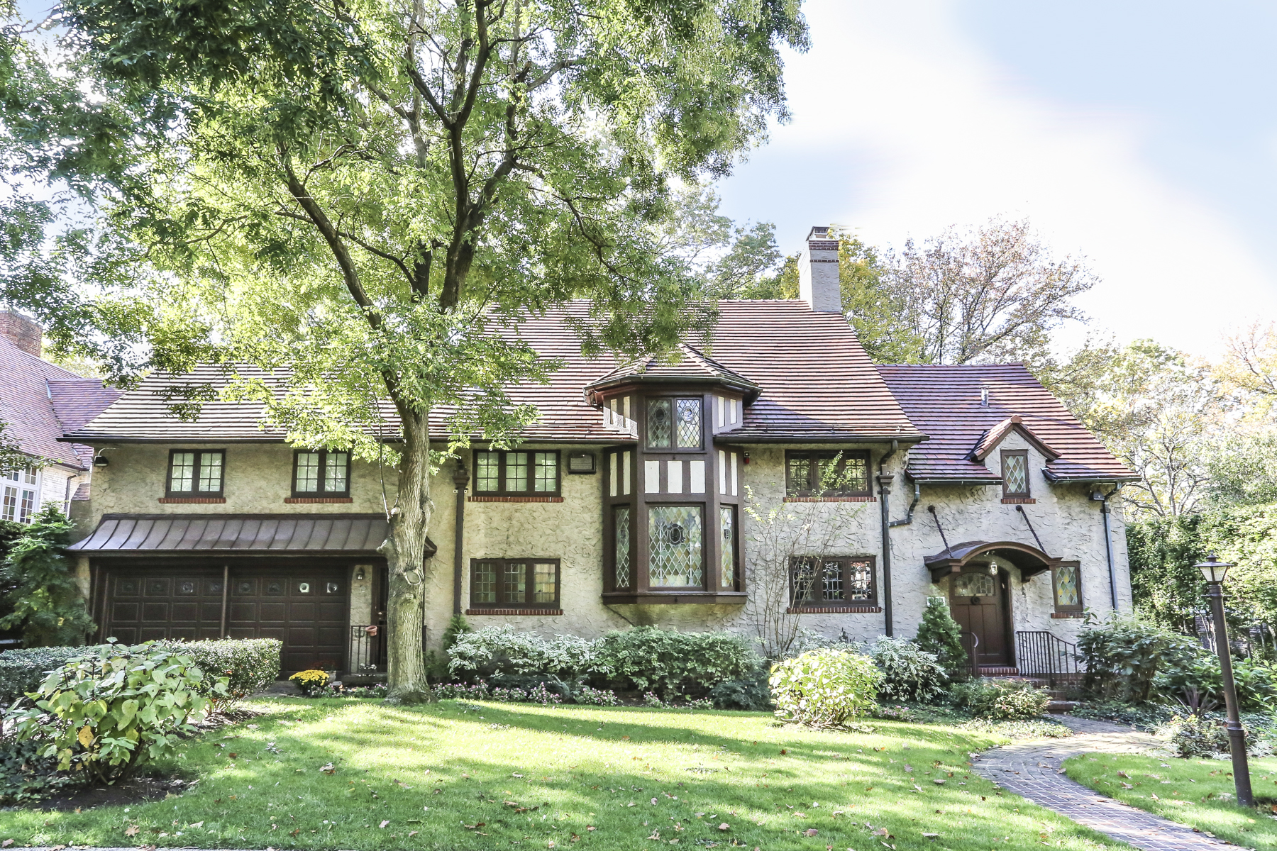 This Forest Hills mansion comes with access to a private park