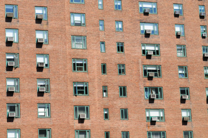 Manhattan apartment building exterior with AC units