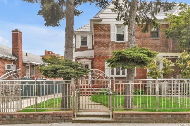 143-20 84 road front lead.png briarcliff queens house