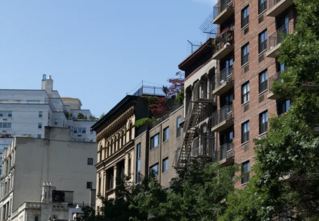 Screenshot 2023-05-08 at 3.19.31 PM.png A mix of NYC residential buildings and blue sky