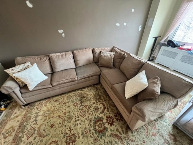 The author's well-worn, six-seater Ethan Allen sleeper couch