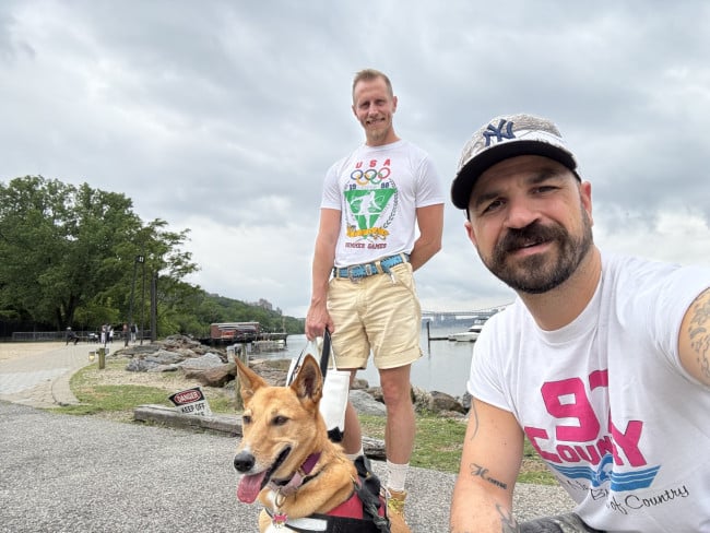 Paul Passavant and Matthew Conley with their pup, Sting Rae.