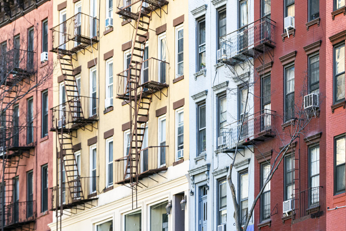 Block of colorful old apartment buildings in the Alphabet City neighborhood of Manhattan in New York City NYC