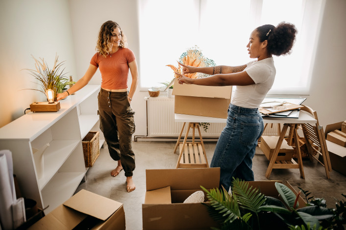 college grads moving into apartment