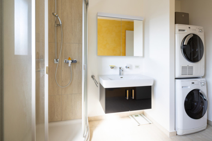 Image of a washer and dryer unit in a New York City apartment