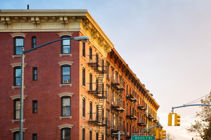 Brooklyn brownstone apartment buildings at sunset