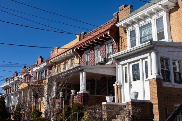 Row of Beautiful Old Brick Homes in Astoria Queens New York stock photo