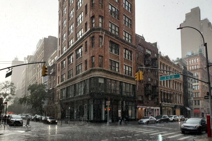 Rain on the intersection of Broadway and 12th Street in New York City