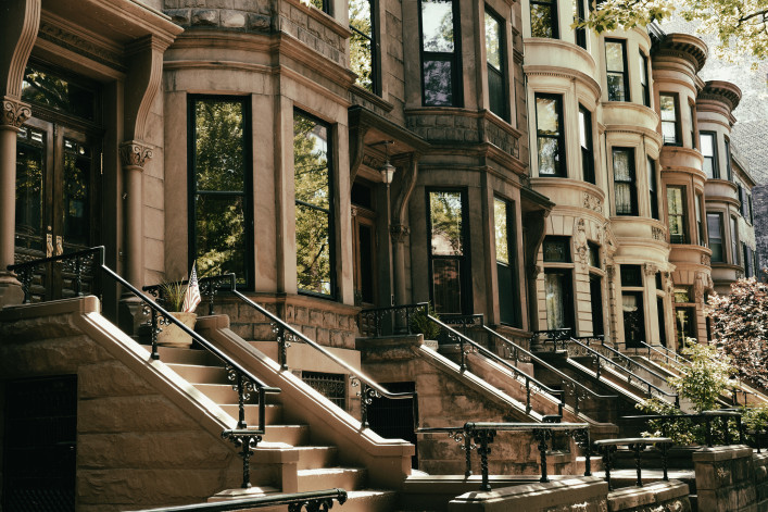 Row of brownstones in Park Slope Brooklyn on an autumn morning. NYC.