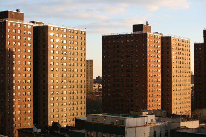Sunset light on public housing project in Harlem, high angle view, New York City, NY, USA.