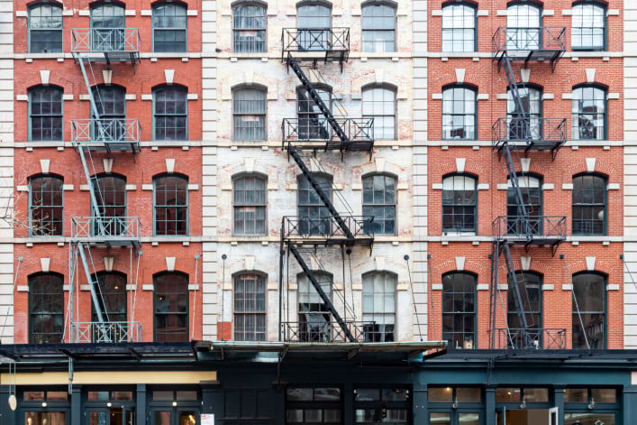 Exterior view of historic brick buildings along Duane Street in the Tribeca neighborhood of New York City NYC