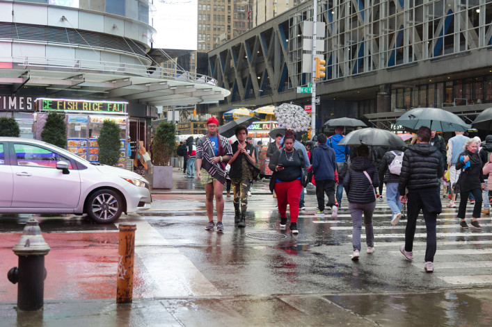 5th Avenue and 42nd Street in Manhattan on a rainy day.