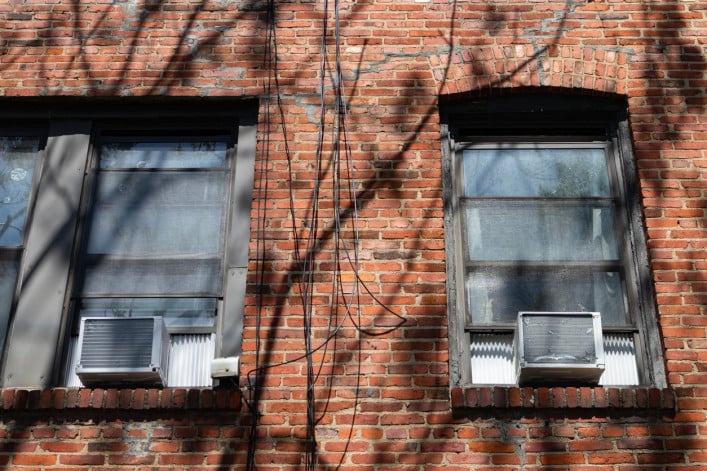 Building facade with air conditioners