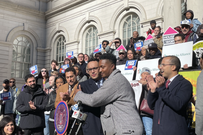 Council members Chi Ossé and Shaun Abreu at a rally before the FARE Act vote in November.