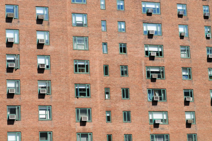 Manhattan apartment building exterior with AC units