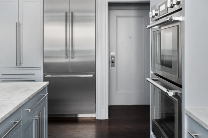 Longer wait times expected due to ongoing supply chain disruptions; up to 12 months for high-end appliance brands (photo of Bolster's Upper East Side renovation kitchen / refrigerator