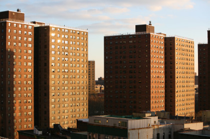 Sunset light on public housing project in Harlem, high angle view, New York City, NY, USA.
