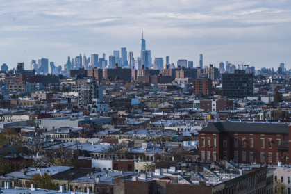 Residential district in Bushwick, Brooklyn, New York, with the distant view on Freedom Tower in Lower Manhattan.
