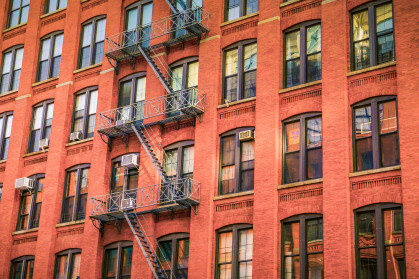 A brick new york city apartment facade.