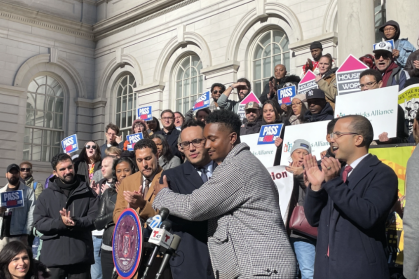 Council members Chi Ossé and Shaun Abreu at a rally before the FARE Act vote in November.