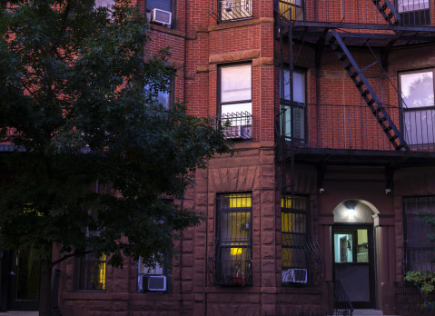 Red brick apartment building in Park Slope in the evening