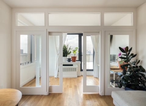 Manhattan Pressurized Walls temporary wall with plexiglass window