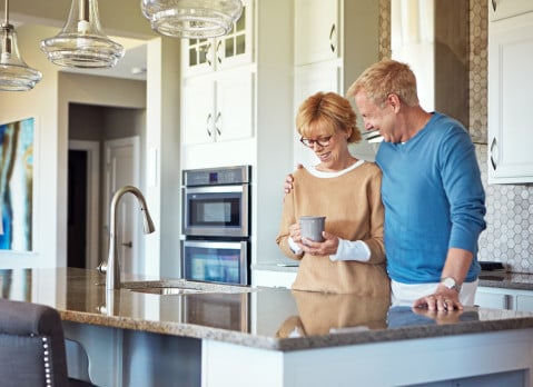 empty nesters in modern kitchen