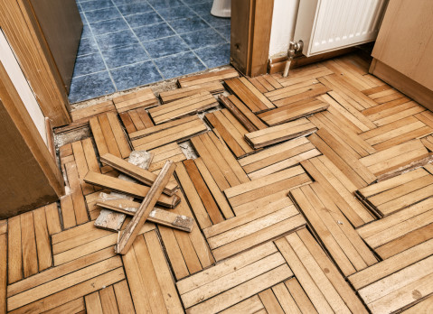 Flood damaged parquet floor