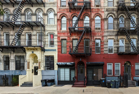 Block of old apartment buildings in the East Village neighborhood of Manhattan in New York City NYC