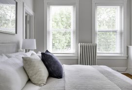 Bedroom with cast iron radiator