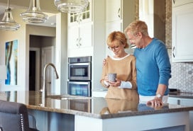 empty nesters in modern kitchen