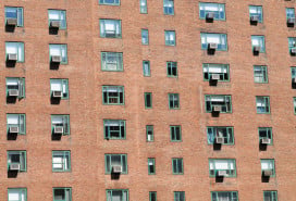 Manhattan apartment building exterior with AC units